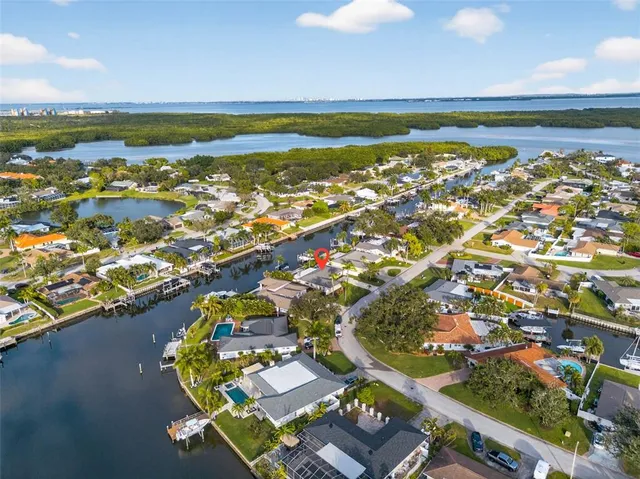 an aerial view of residential building with ocean view