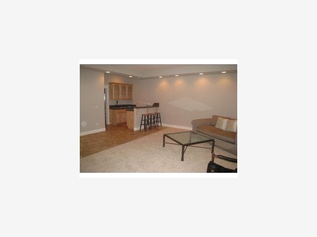 529 Sunrise Road Copperopolis, CA 95228 - Photo 7 of 9 a picture of a living room with a chair and dining table