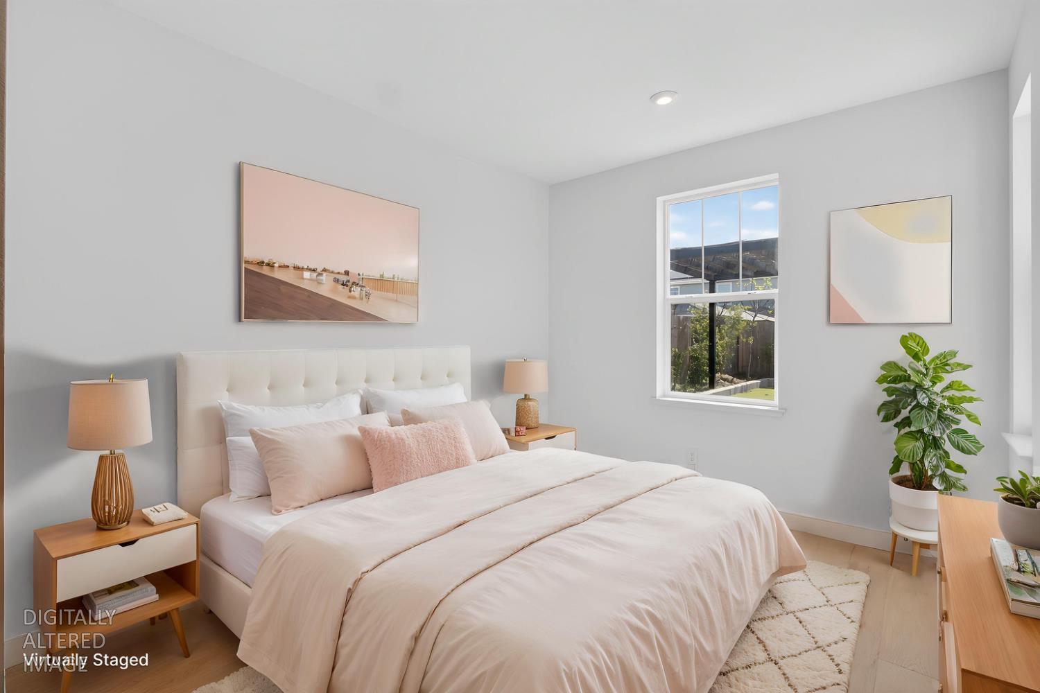 2883 Ridgecrest Drive Lincoln, CA 95648 - Photo 14 of 42 a bedroom with bed and a potted plant