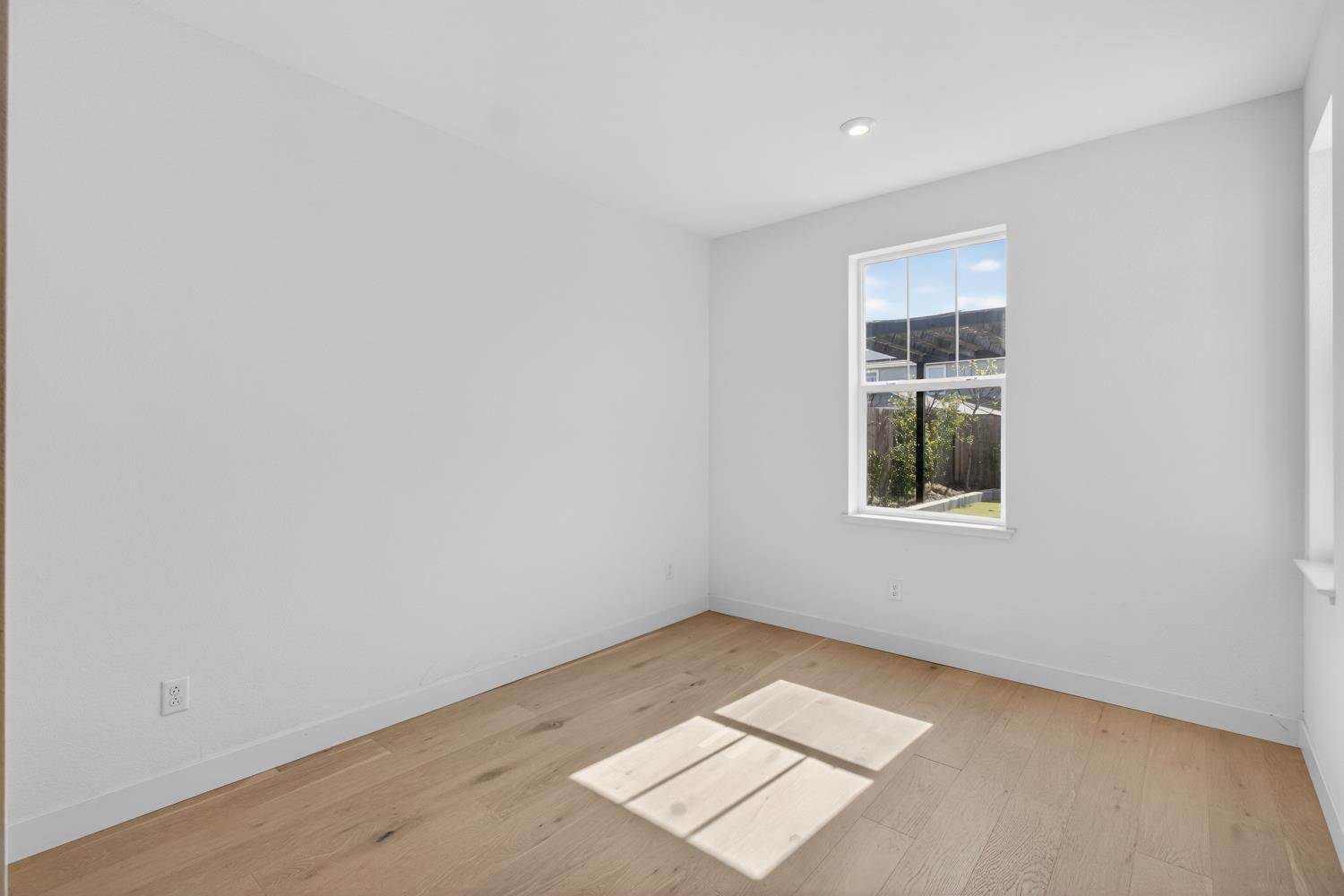 2883 Ridgecrest Drive Lincoln, CA 95648 - Photo 15 of 42 an empty room with windows