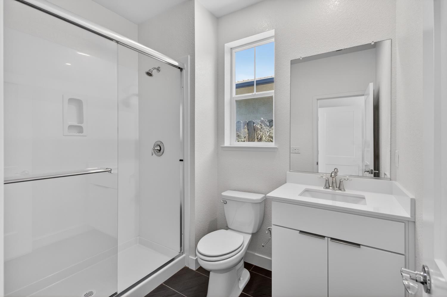 2883 Ridgecrest Drive Lincoln, CA 95648 - Photo 16 of 42 a bathroom with a sink toilet and shower