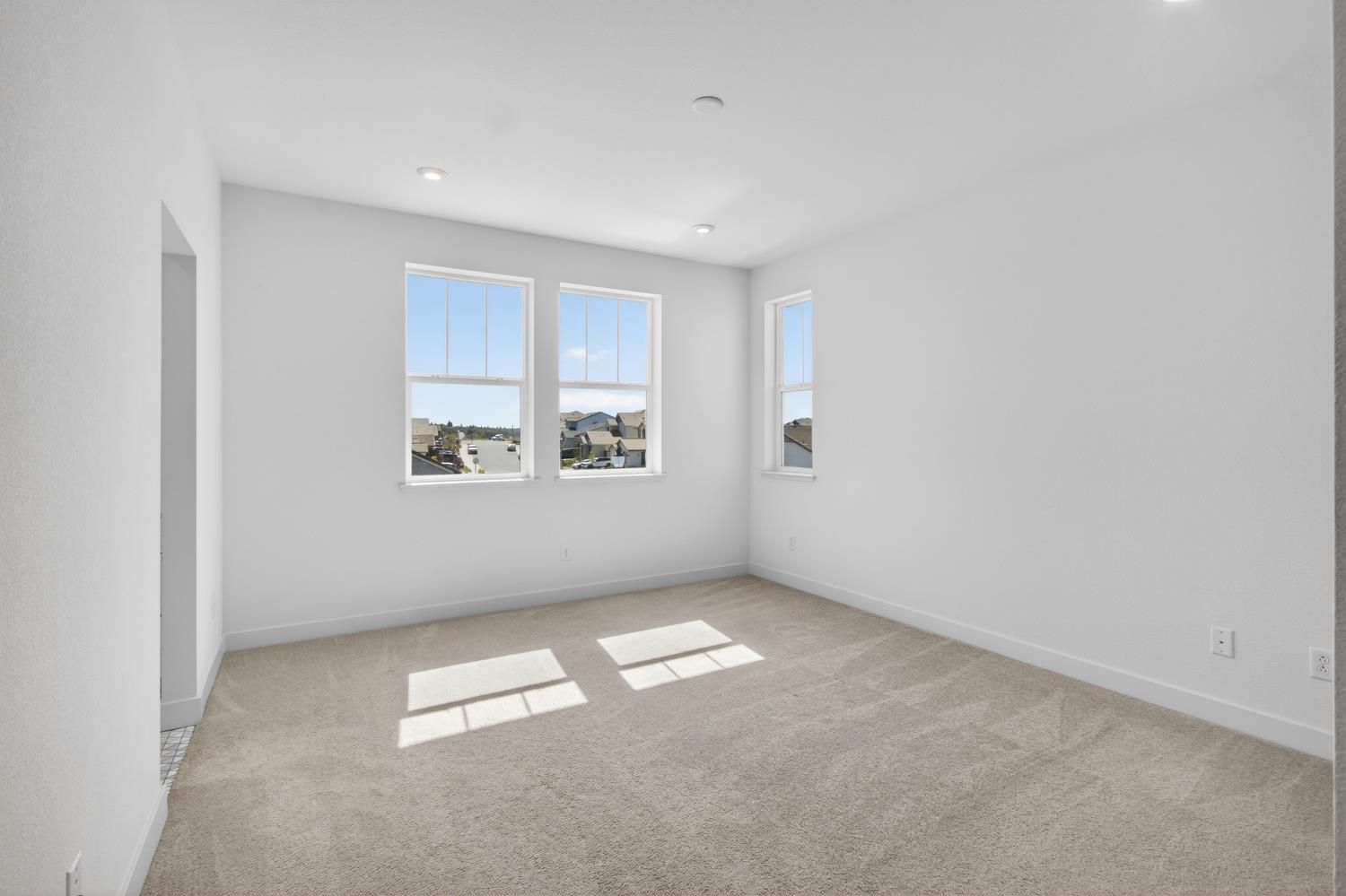 2883 Ridgecrest Drive Lincoln, CA 95648 - Photo 22 of 42 an empty room with windows