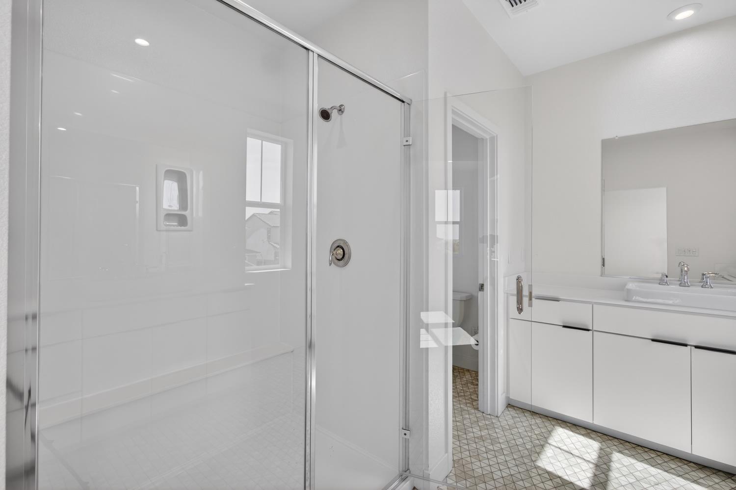 2883 Ridgecrest Drive Lincoln, CA 95648 - Photo 24 of 42 a bathroom with a shower and a sink