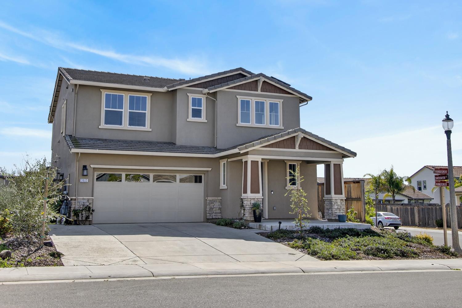 2883 Ridgecrest Drive Lincoln, CA 95648 - Photo 5 of 42 a front view of a house with a garden