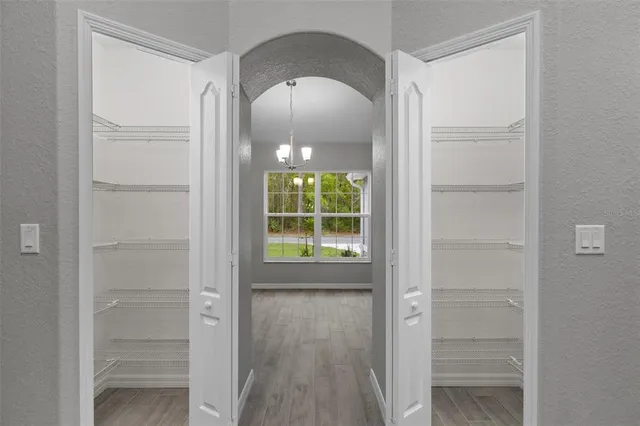 a bathroom with a mirror and a shower