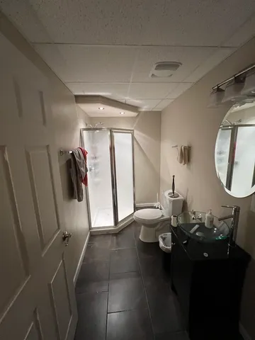 a bathroom with a sink and mirror