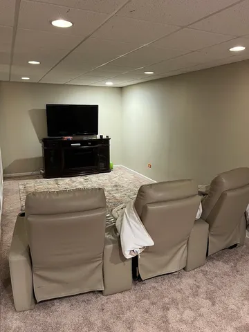 a living room with a couch and a flat screen tv