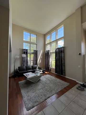 a room with gym equipment and a window