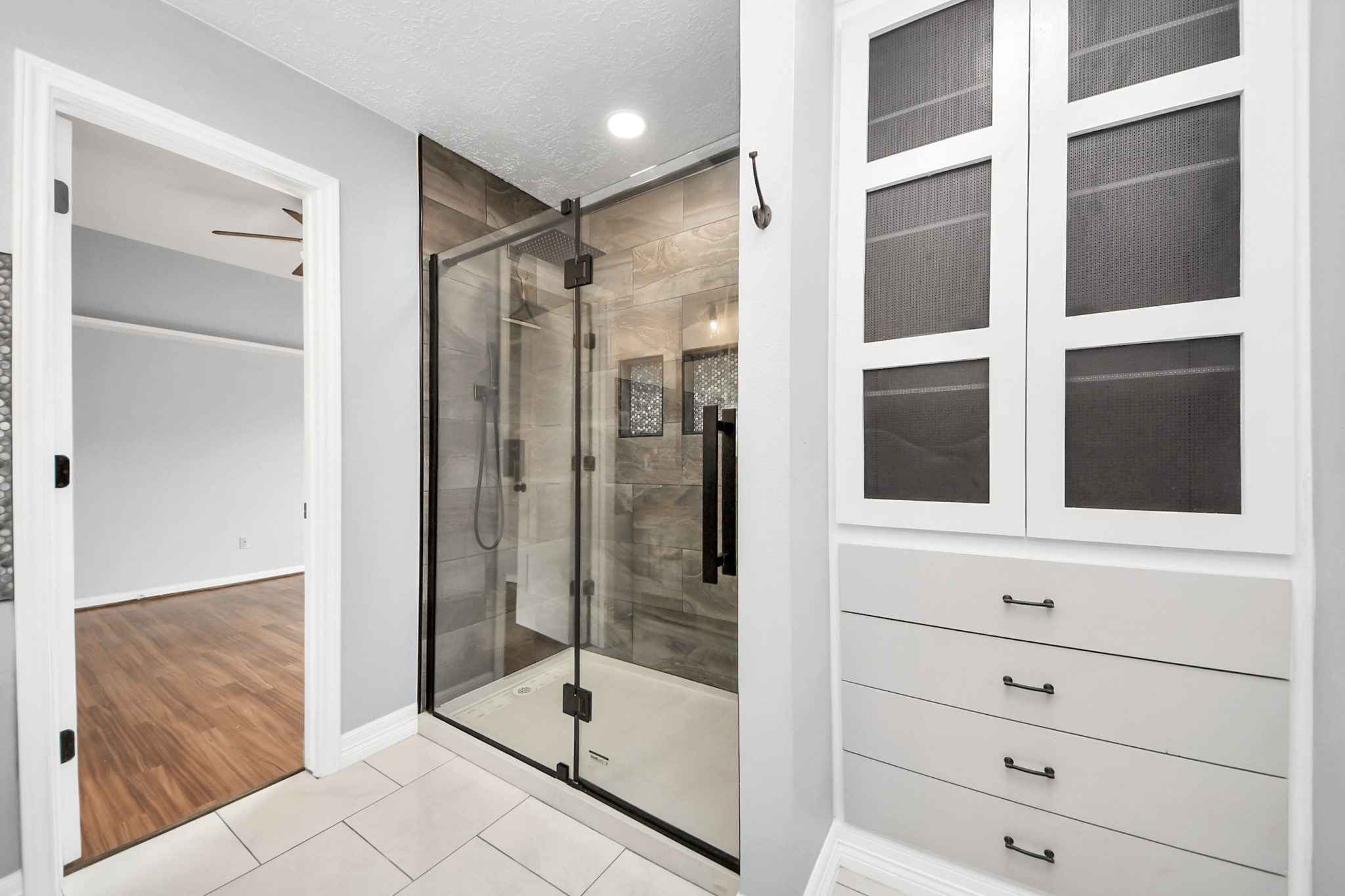 28707 Stapleford Street Spring, TX 77386 - Photo 22 of 38 a bathroom with a shower and closet