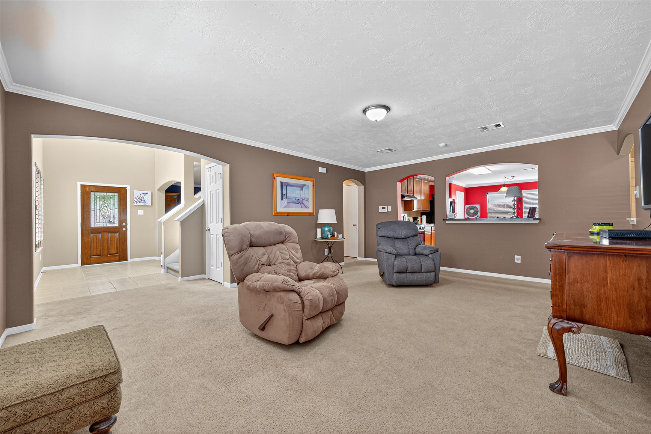 22402 Bridgestone Ridge Drive Spring, TX 77389 - Photo 13 of 49 a living room with furniture gym equipment and window