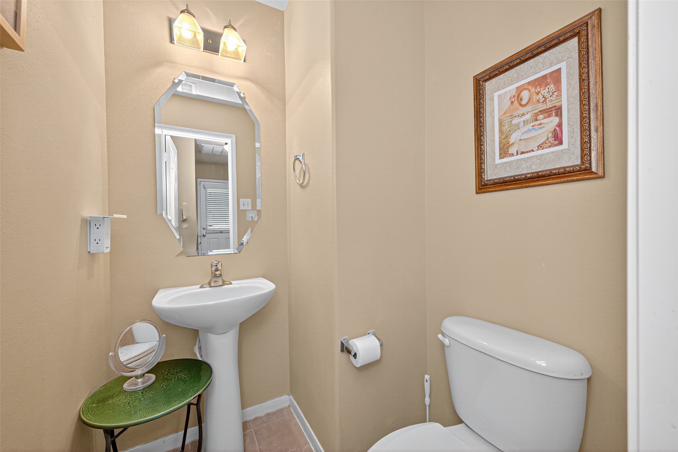 22402 Bridgestone Ridge Drive Spring, TX 77389 - Photo 21 of 49 a bathroom with a toilet a sink and a mirror