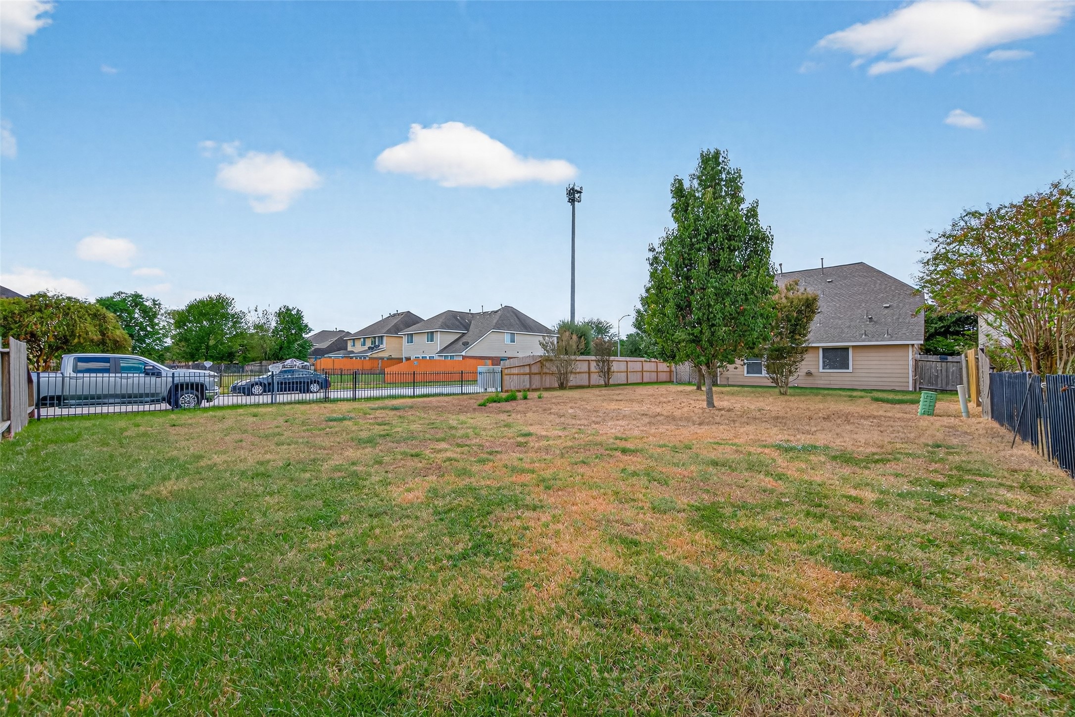 22402 Bridgestone Ridge Drive Spring, TX 77389 - Photo 48 of 49 a view of a house with a big yard and large trees