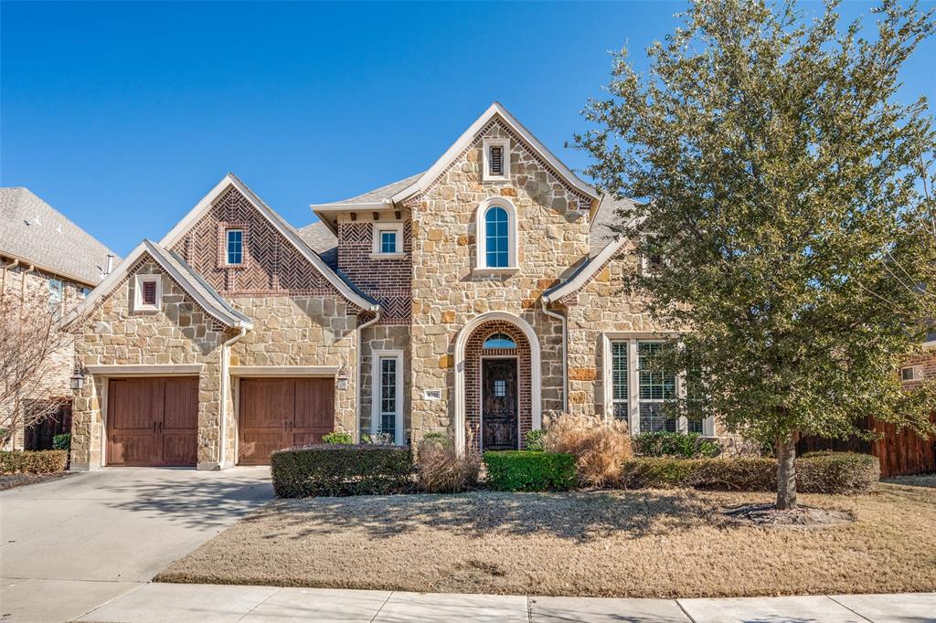 8310 Sylvan Dale Road Frisco, TX 75036 - Photo 1 of 1 a front view of a house with garden