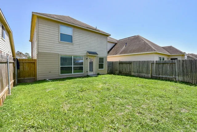 a view of a house with a garden