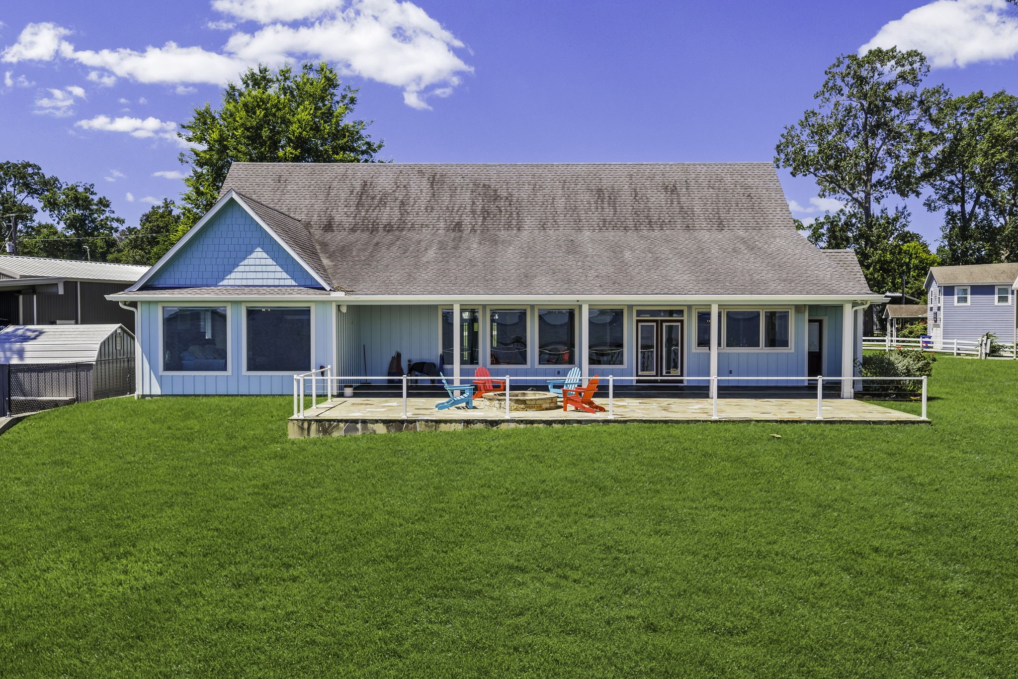 151 Key Largo Loop Point Blank, TX 77364 - Photo 28 of 49 Relax and entertain on the expansive lakeside deck overlooking breathtaking open water.