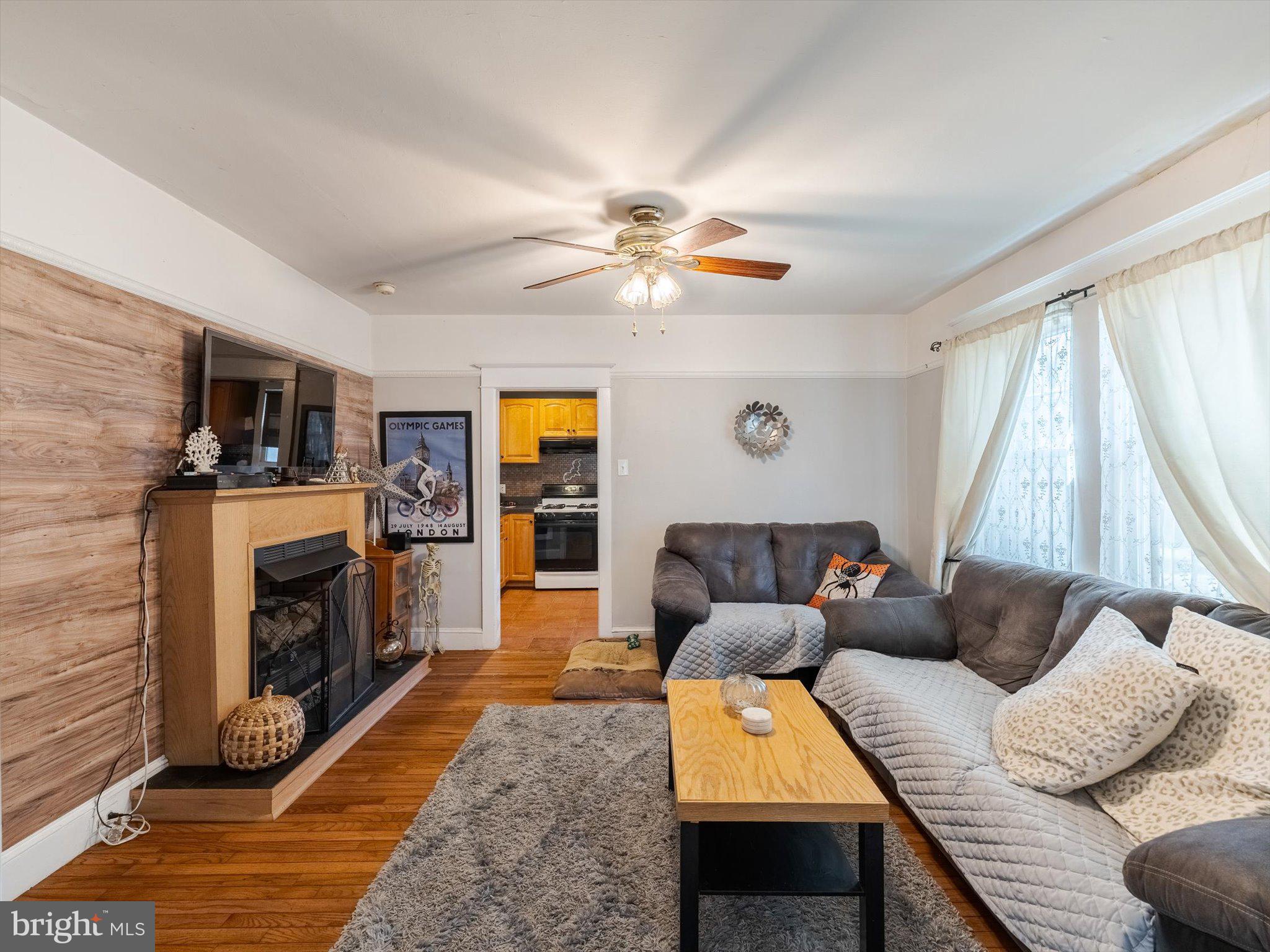 441 Cricket Avenue Glenside, PA 19038 - Photo 12 of 28 a living room with furniture and a fireplace
