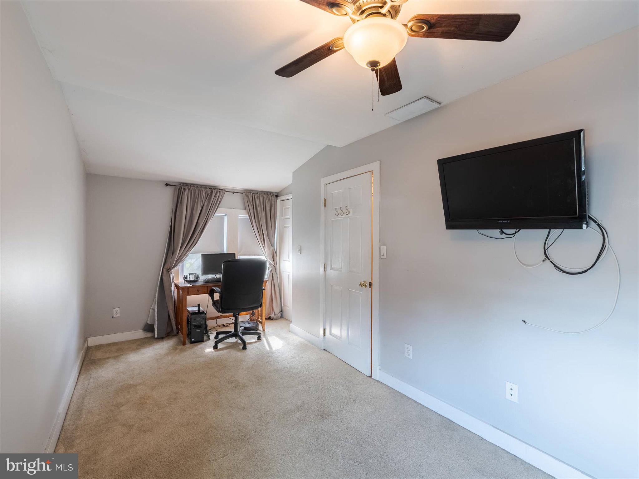 441 Cricket Avenue Glenside, PA 19038 - Photo 19 of 28 a view of a livingroom with workspace and a window