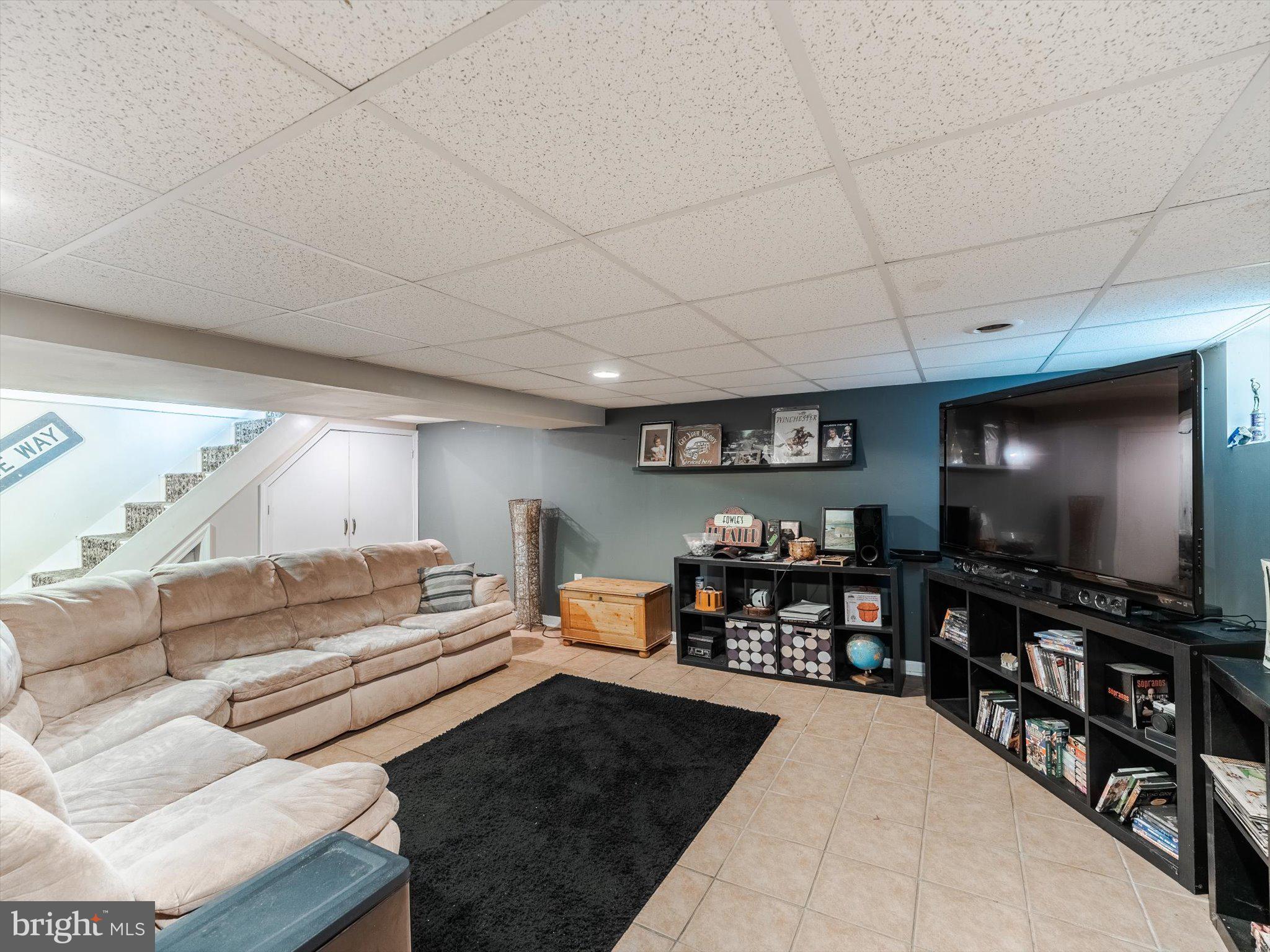 441 Cricket Avenue Glenside, PA 19038 - Photo 25 of 28 a living room with furniture and a flat screen tv