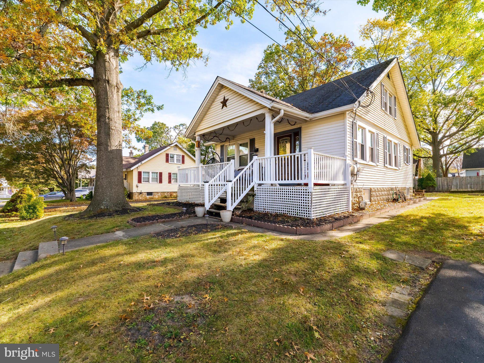441 Cricket Avenue Glenside, PA 19038 - Photo 3 of 28 a view of a house with a big yard and large tree