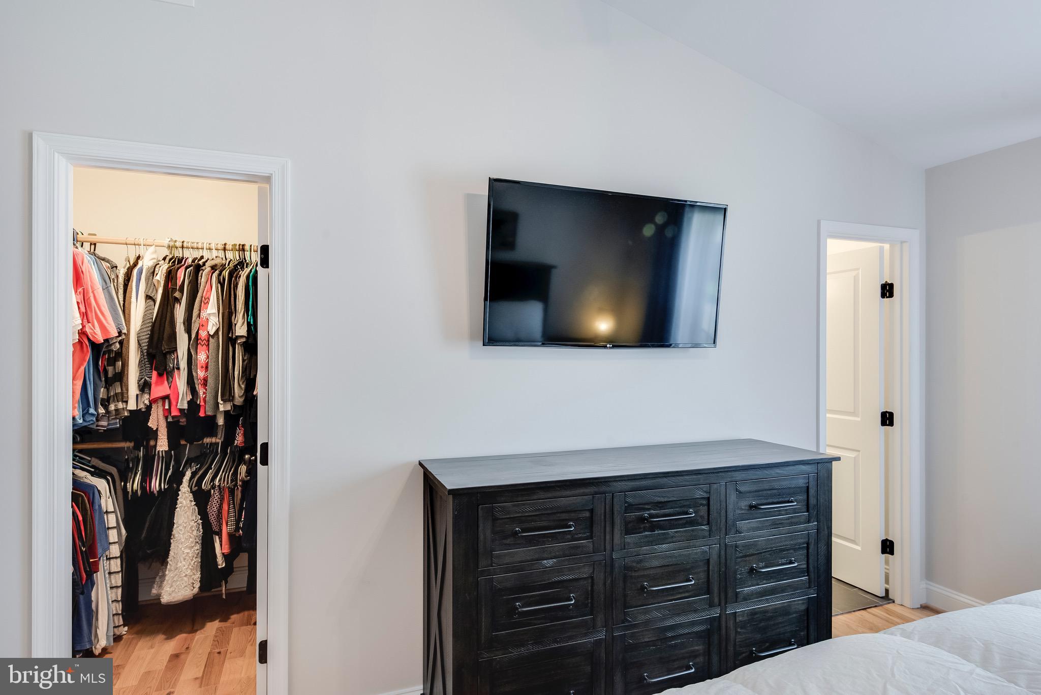 1724 Tacoma Road Edgewater, MD 21037 - Photo 34 of 81 a bedroom with a bed and a flat screen tv