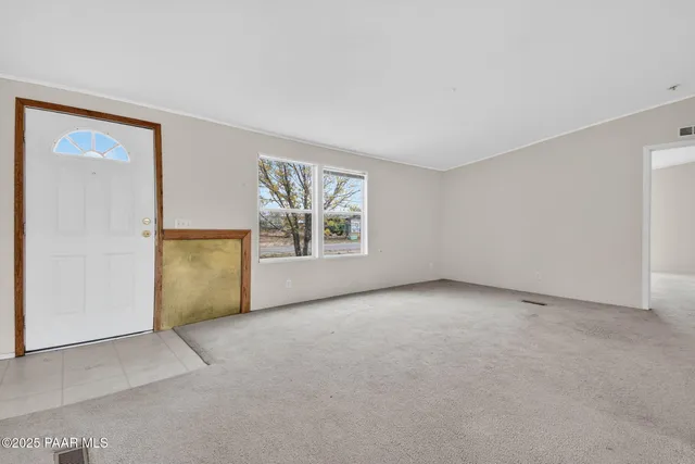 a kitchen with a stove a refrigerator and a sink