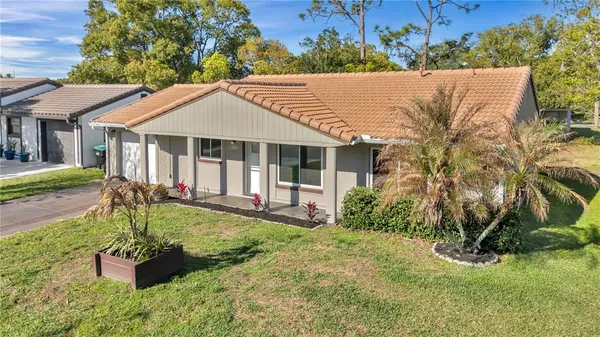 front view of a house with a yard