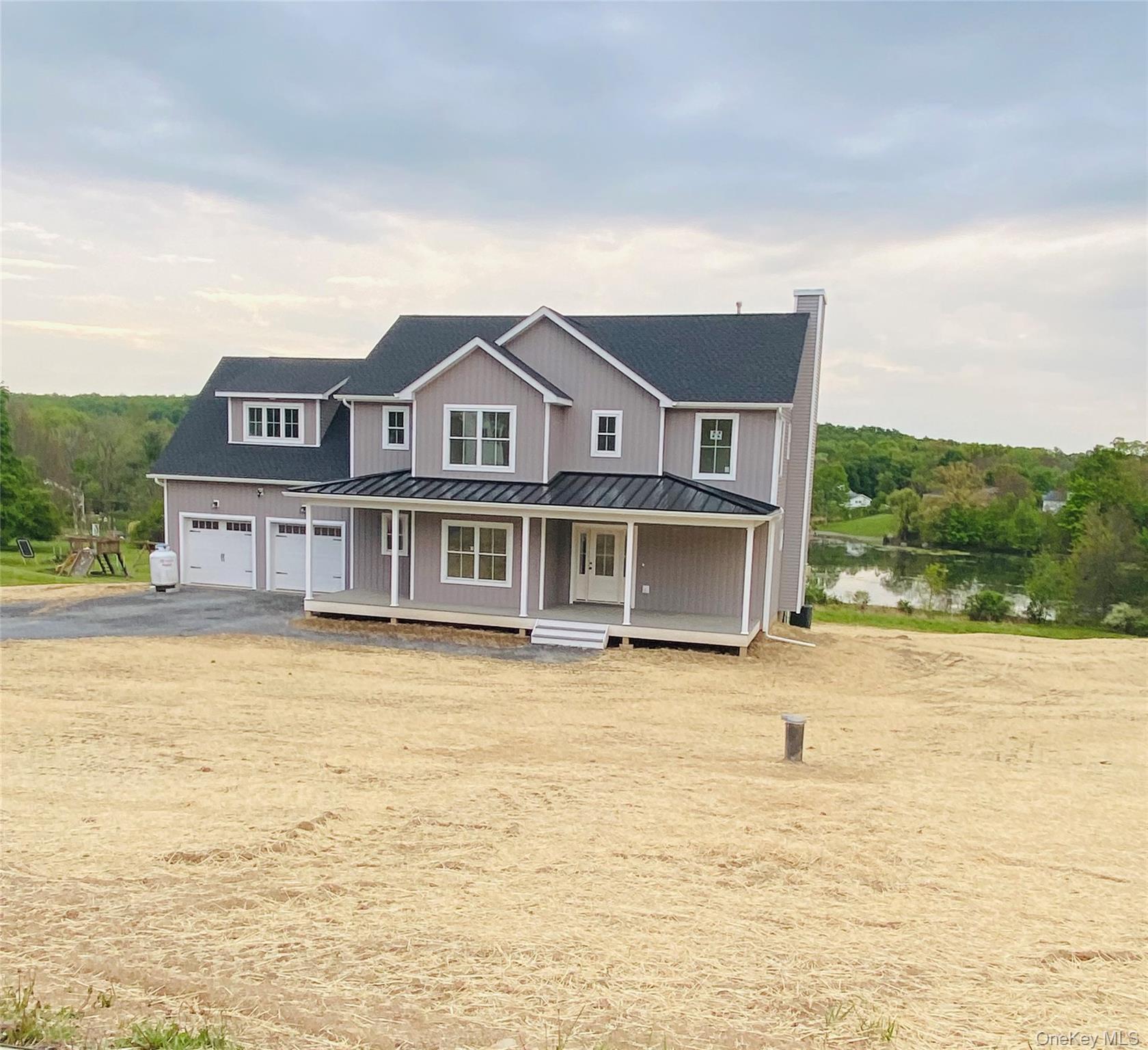 750 Ridgebury Road Slate Hill, NY 10973 - Photo 40 of 41 a front view of a house with a large pool
