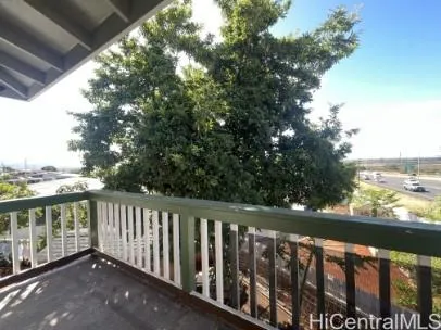 a view of a balcony with city view