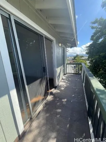 a bathroom with a shower and a sink