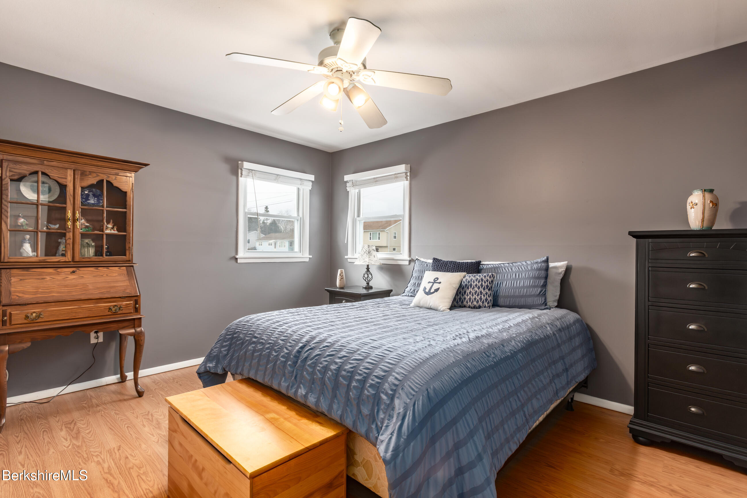 101 Imperial Avenue Pittsfield, MA 01201 - Photo 10 of 26 a bedroom with a bed and a chandelier