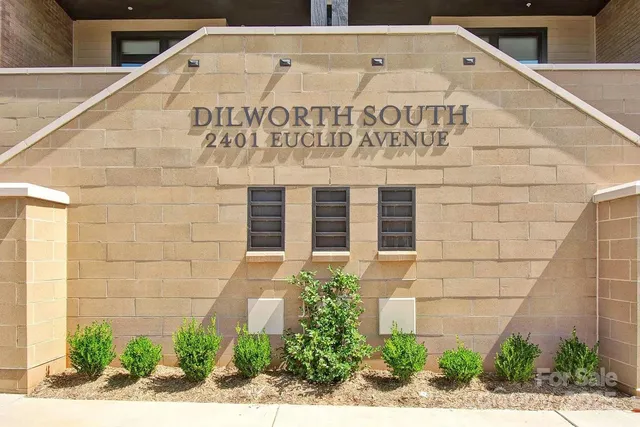 a sign on the side of a building