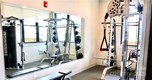 a view of a room with gym equipment