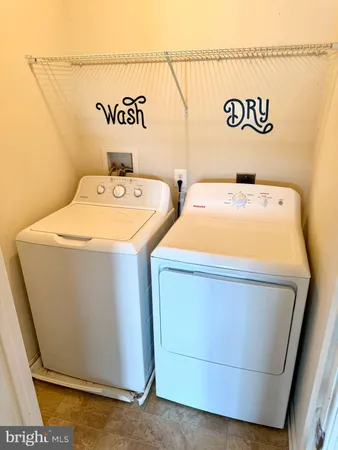 a utility room with a washer and dryer