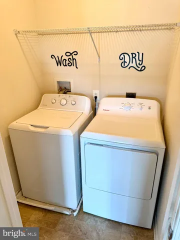 a utility room with a washer and dryer