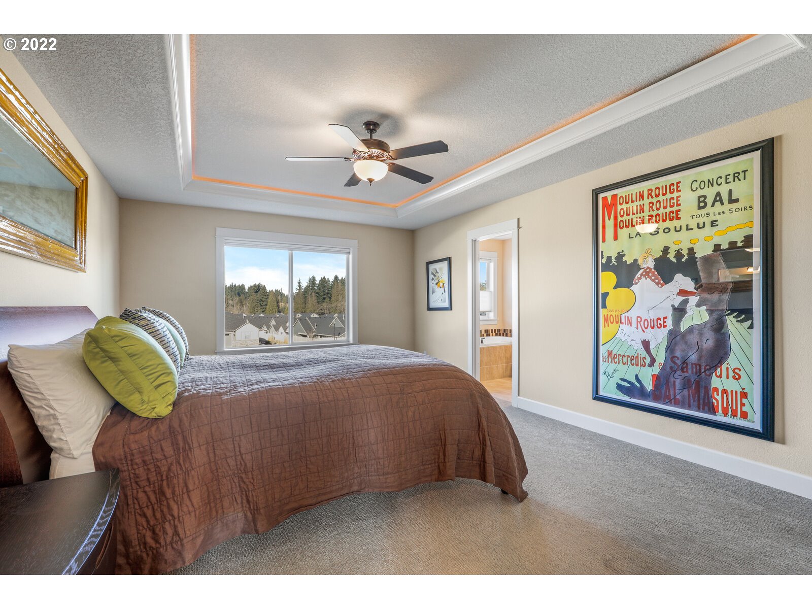 1704 Northeast 172nd Street Ridgefield, WA 98642 - Photo 19 of 31 a bedroom with a bed and painting on the wall