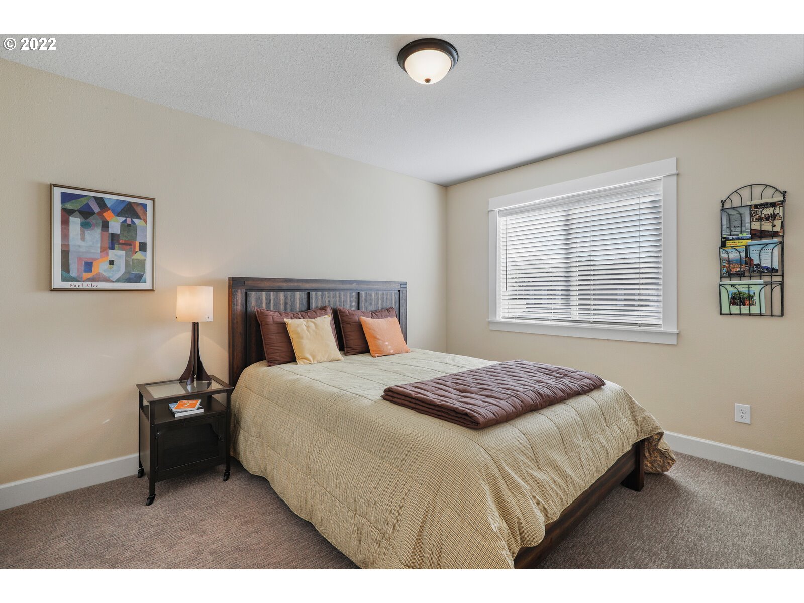 1704 Northeast 172nd Street Ridgefield, WA 98642 - Photo 25 of 31 a bedroom with a bed and a window