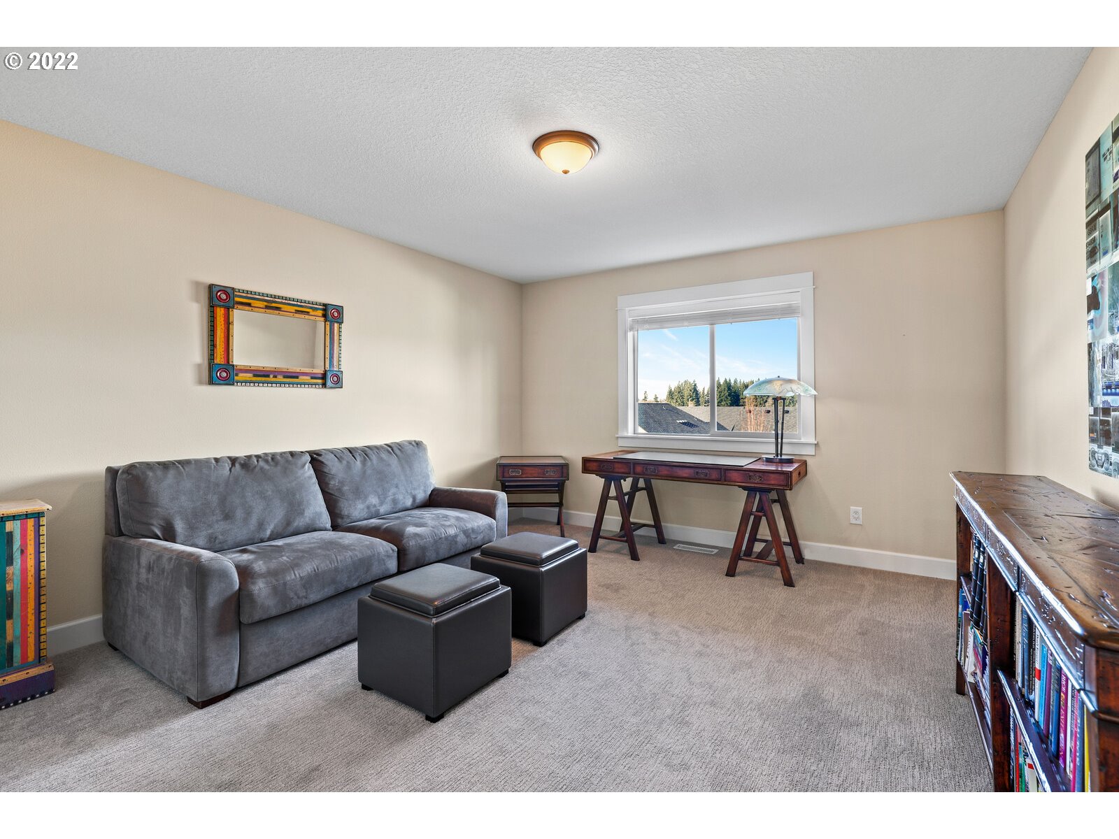 1704 Northeast 172nd Street Ridgefield, WA 98642 - Photo 27 of 31 a living room with furniture and a window