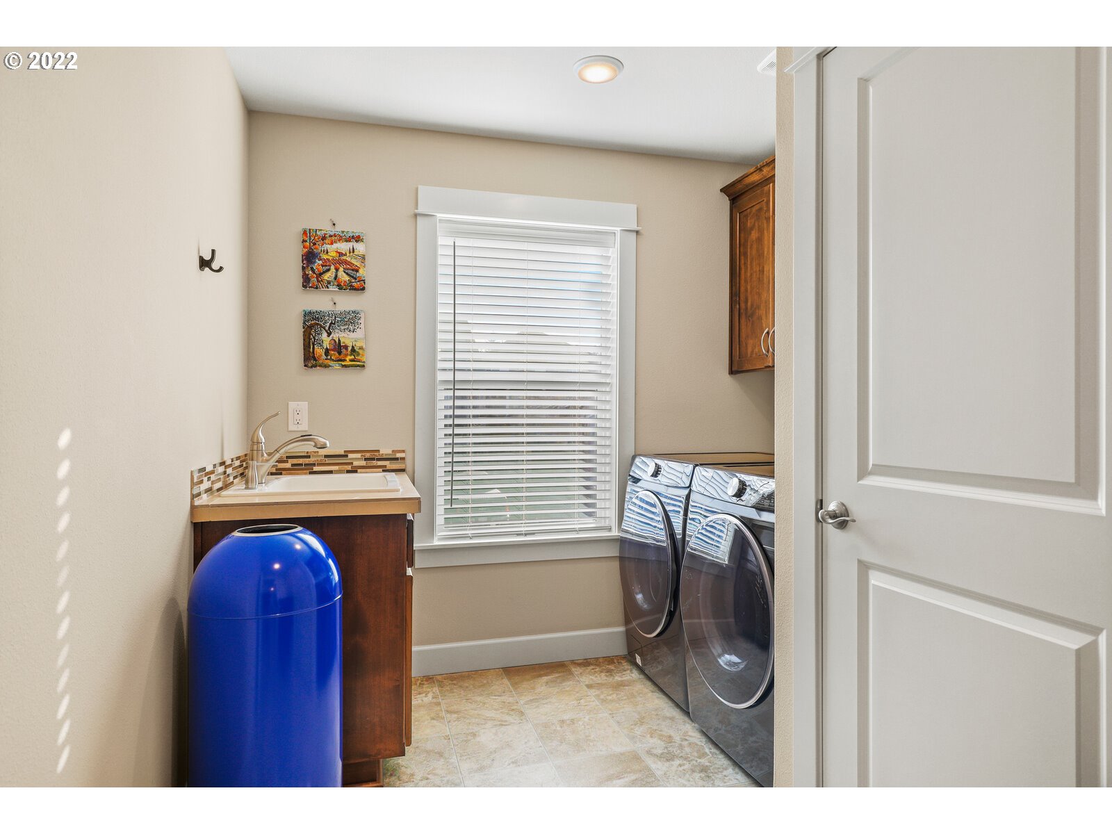 1704 Northeast 172nd Street Ridgefield, WA 98642 - Photo 28 of 31 a bedroom with a bed and a window