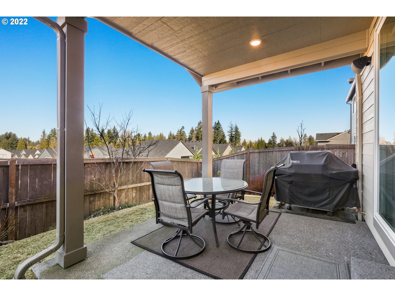 1704 Northeast 172nd Street Ridgefield, WA 98642 - Photo 29 of 31 a view of a terrace with furniture and a potted plant