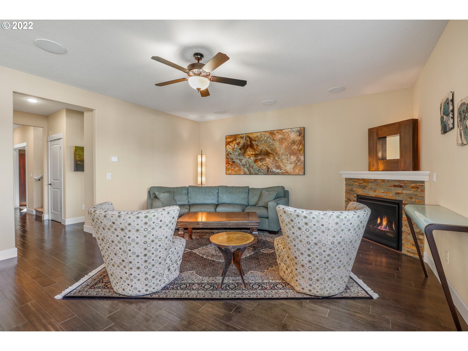 1704 Northeast 172nd Street Ridgefield, WA 98642 - Photo 7 of 31 a living room with furniture and a chandelier