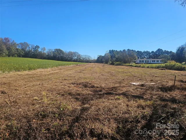 a view of an ocean and a mountain