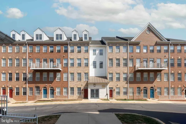 a front view of a building with glass windows