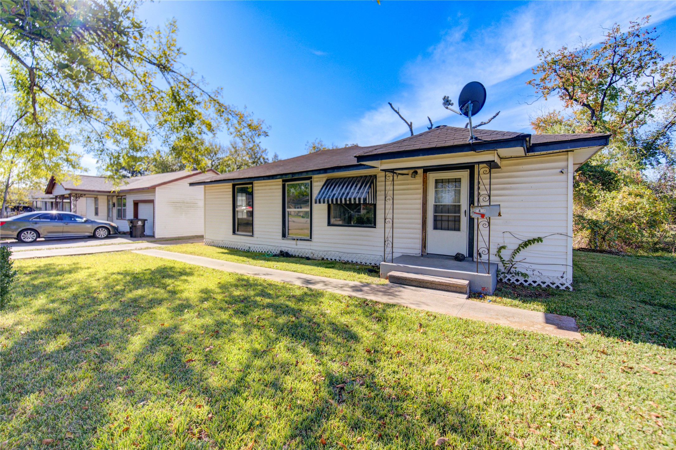 3431 Sayers Street Houston, TX 77026 - Photo 3 of 44 a view of a house with pool and chairs