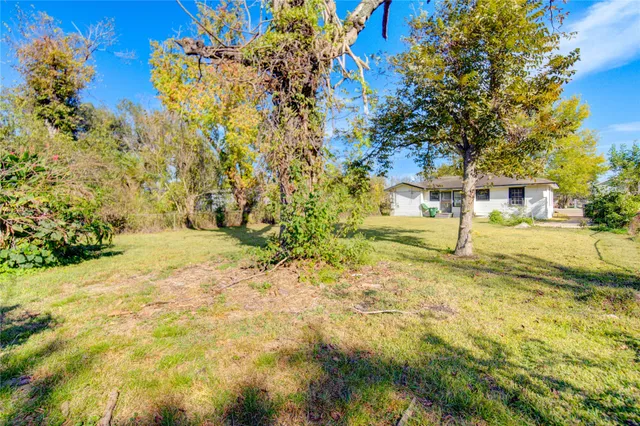 a view of a house with swimming pool