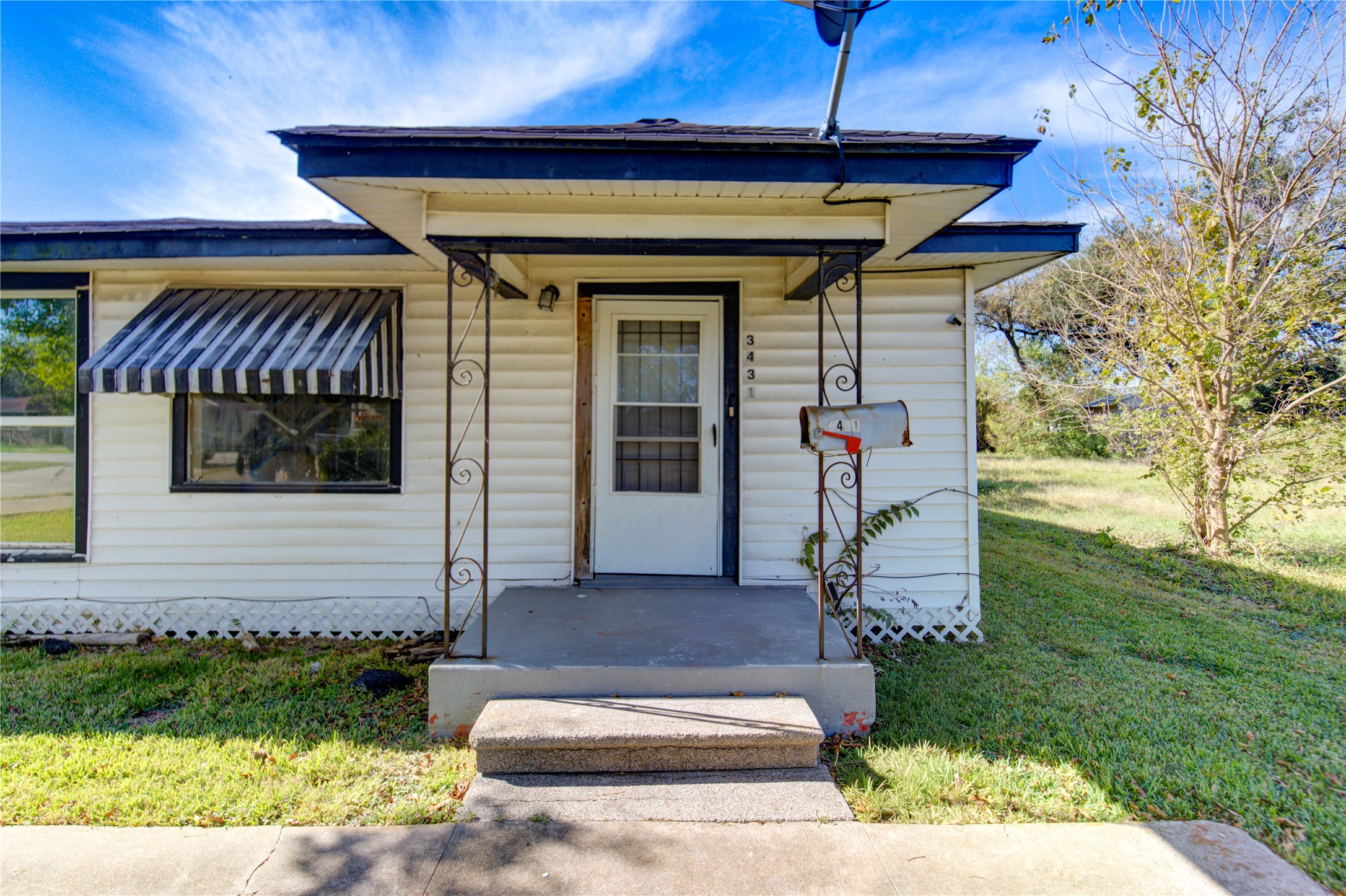 3431 Sayers Street Houston, TX 77026 - Photo 8 of 44 a front view of a house with garden