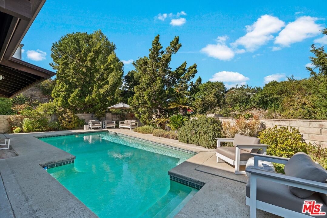 8636 Edwin Drive Los Angeles, CA 90046 - Photo 22 of 25 a view of swimming pool with seating space