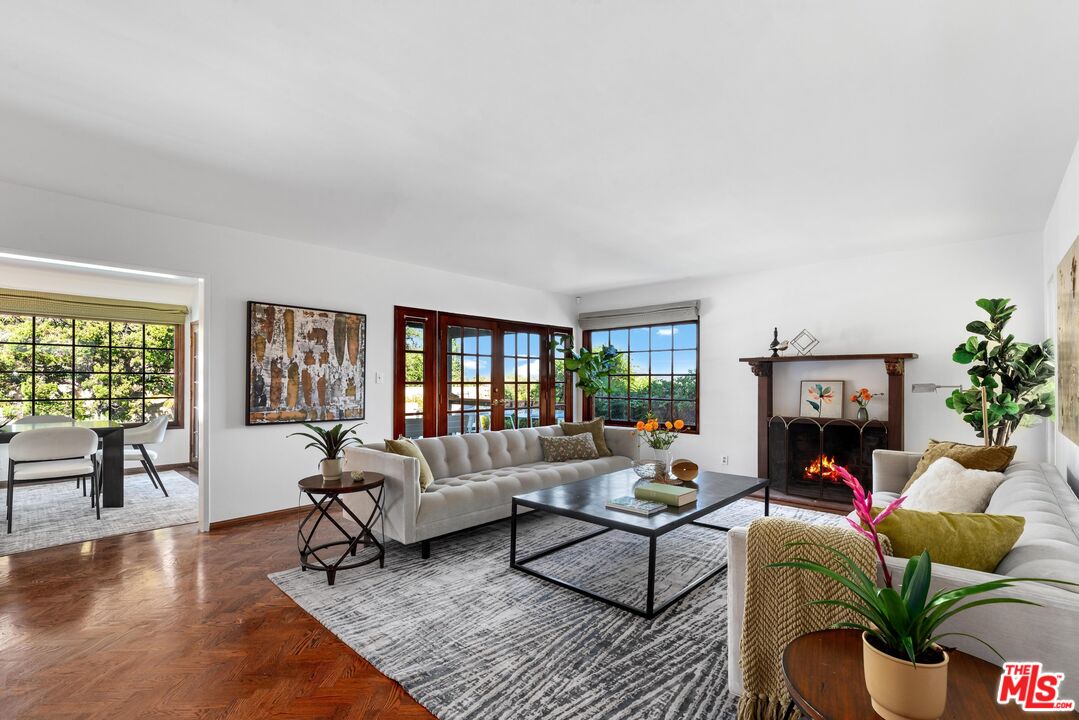 8636 Edwin Drive Los Angeles, CA 90046 - Photo 3 of 25 a living room with fireplace furniture and a fireplace