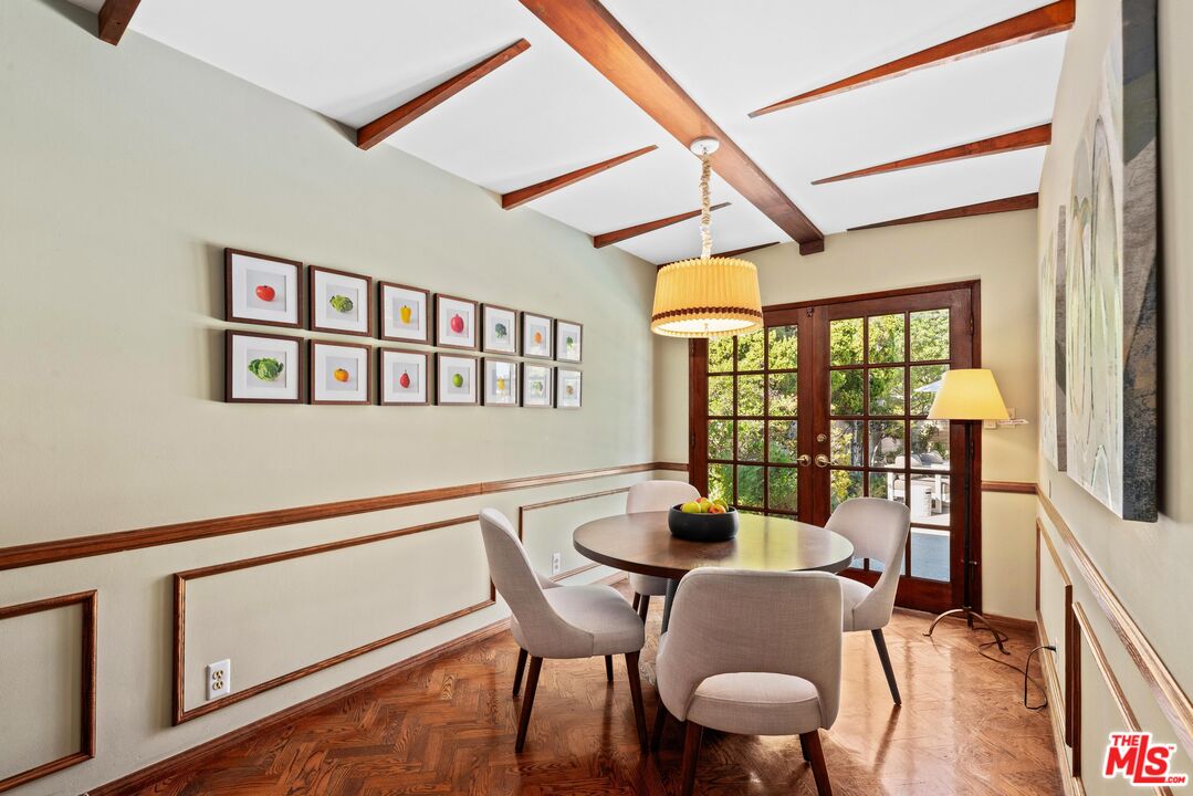 8636 Edwin Drive Los Angeles, CA 90046 - Photo 7 of 25 a view of a dining room with furniture and wooden floor