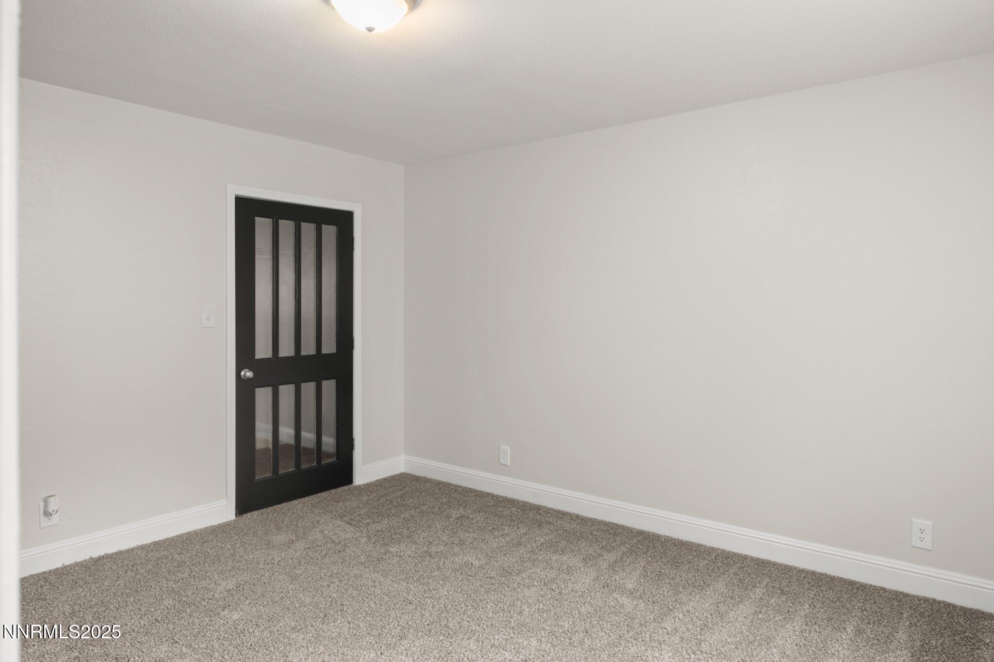 859 B Street Fernley, NV 89408 - Photo 22 of 32 an empty room with windows