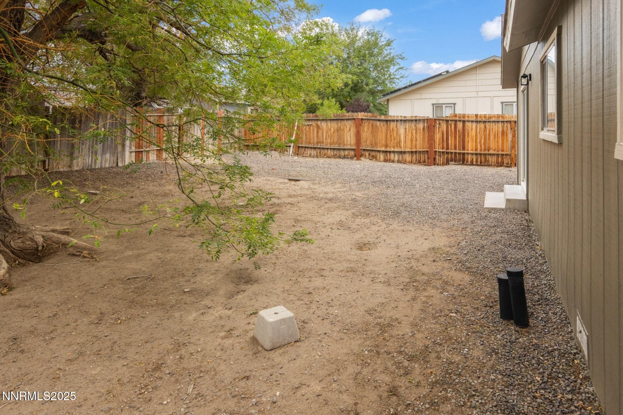 859 B Street Fernley, NV 89408 - Photo 26 of 32 a view of a backyard of the house